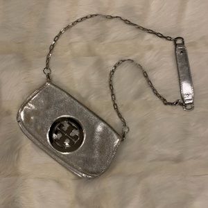 Tory Burch Silver Metallic Clutch with removable chain strap.
